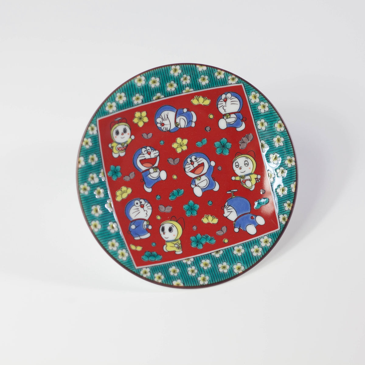 Colorful plate with cartoon character design on a white background