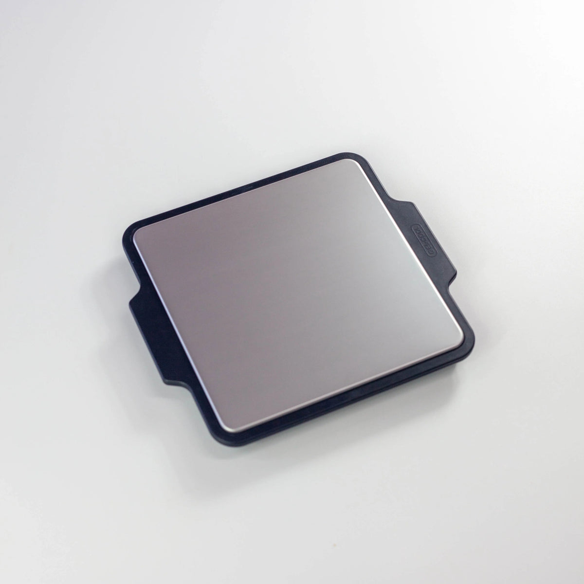 Gel-Cool Rapid Cooling Plate – square aluminum cooling plate with black silicone frame and two side handles, on white background
