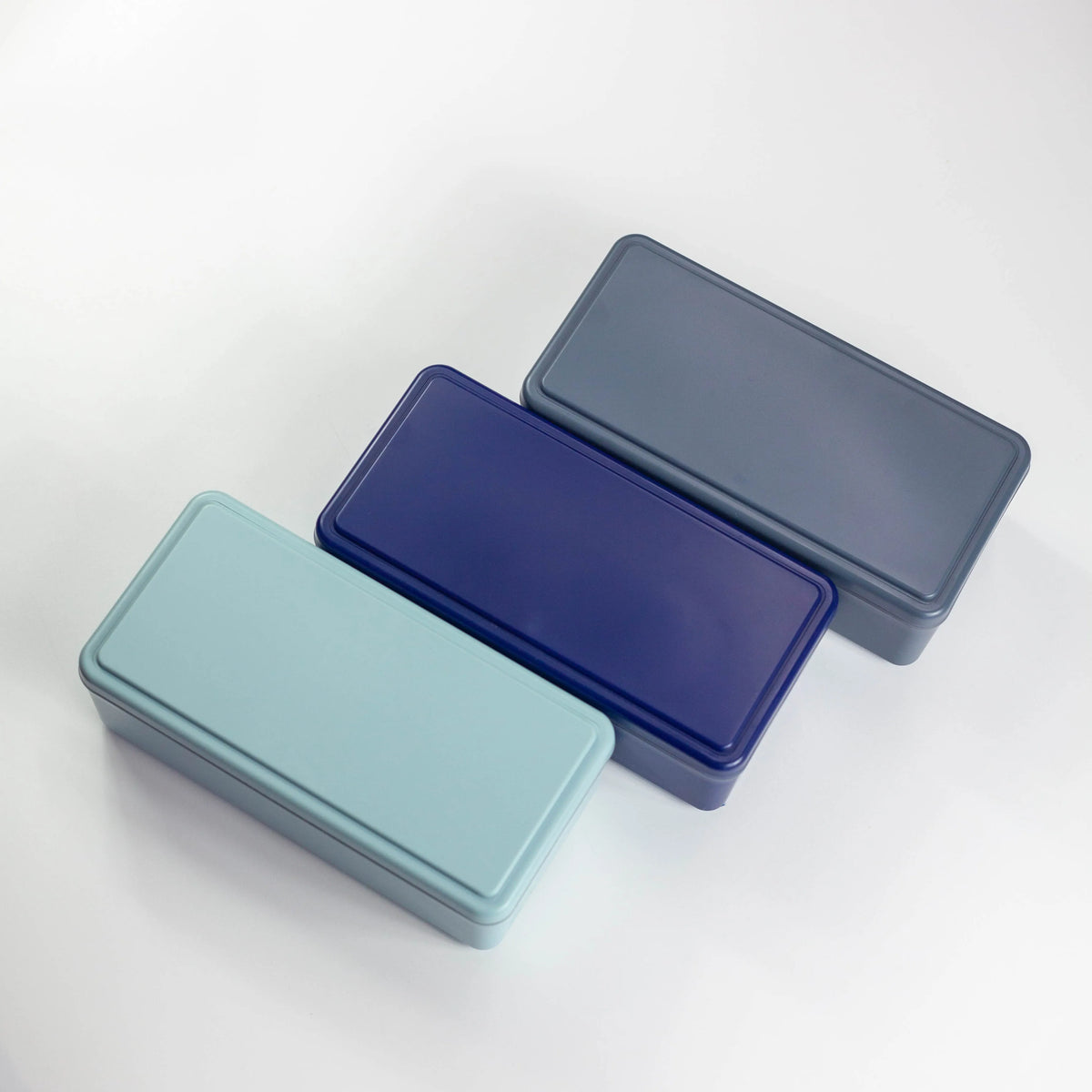 Gel-Cool Two-Tier Bento Box 1000ml in black, closed with beige elastic band, single product shot at an angle on white background