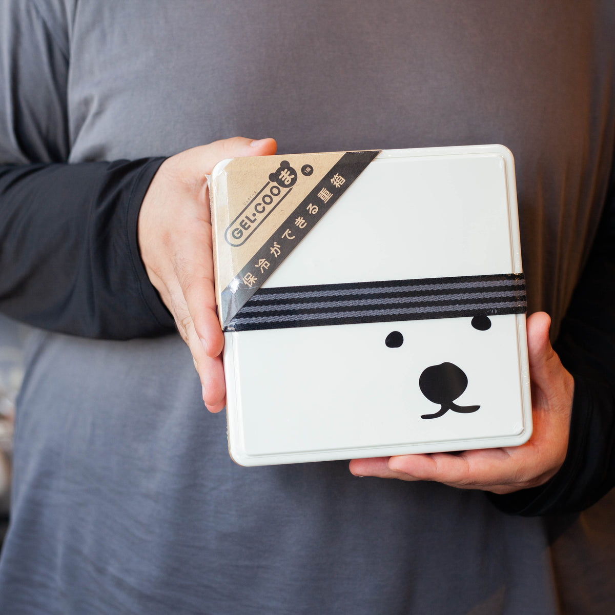 GEL-COOma Bento Box Family – white kbear face design with striped elastic band, front view