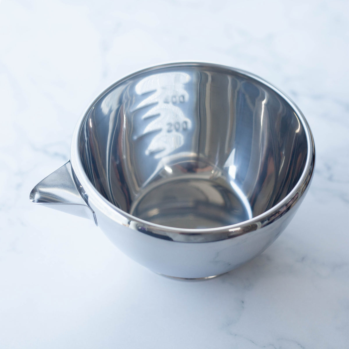 Katakuchi Mixing Bowl 700mL – polished stainless steel with pouring spout, white background