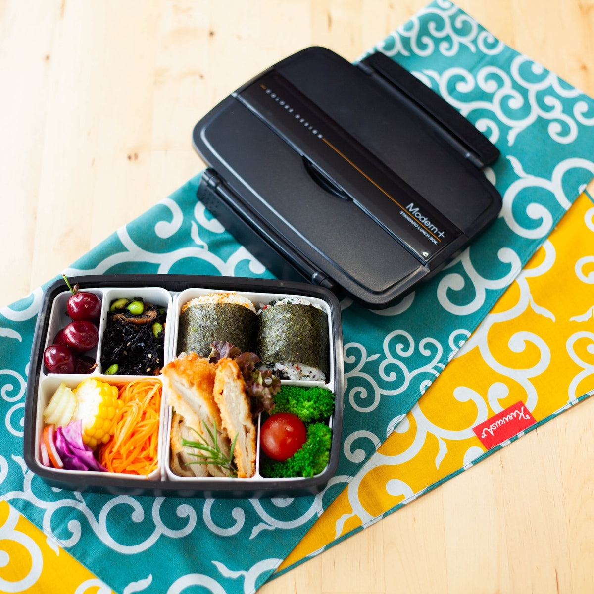 Shikiri Bento Box shown from above with the lid open, revealing interior dividers