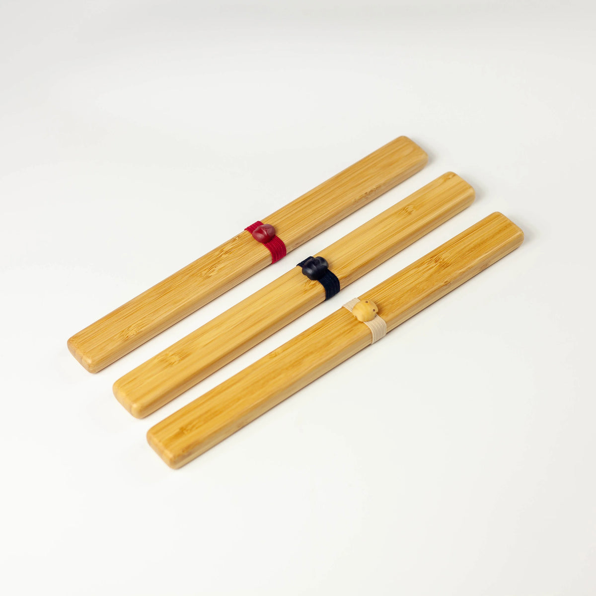 Take Bako bamboo chopsticks set in beige, red, and black with matching travel cases