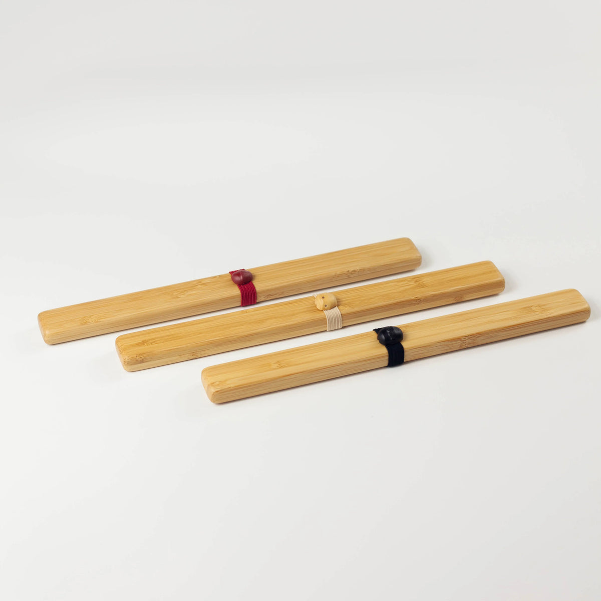 Take Bako bamboo chopsticks set in beige, red, and black with matching travel cases