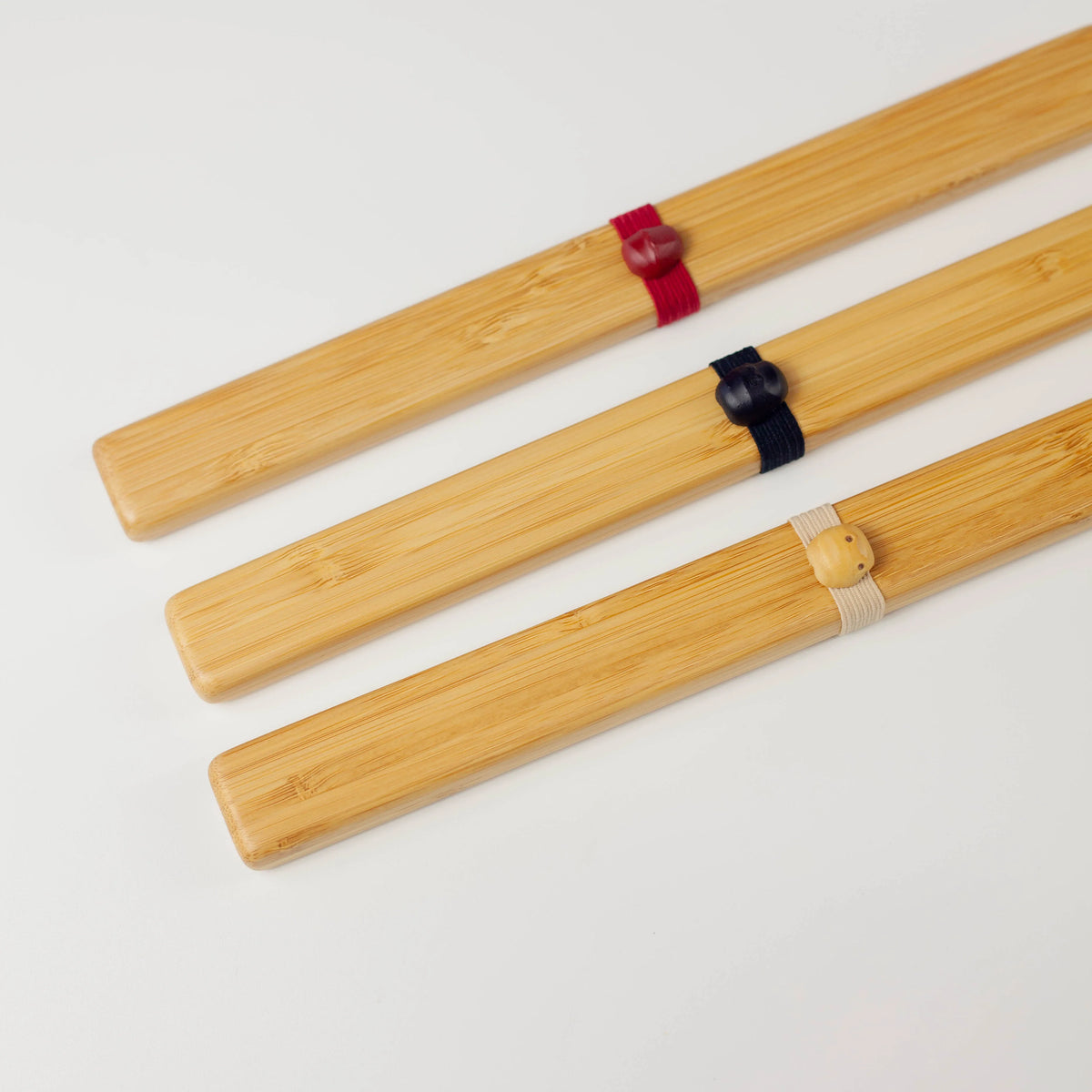 Take Bako bamboo chopsticks set in beige, red, and black with matching travel cases