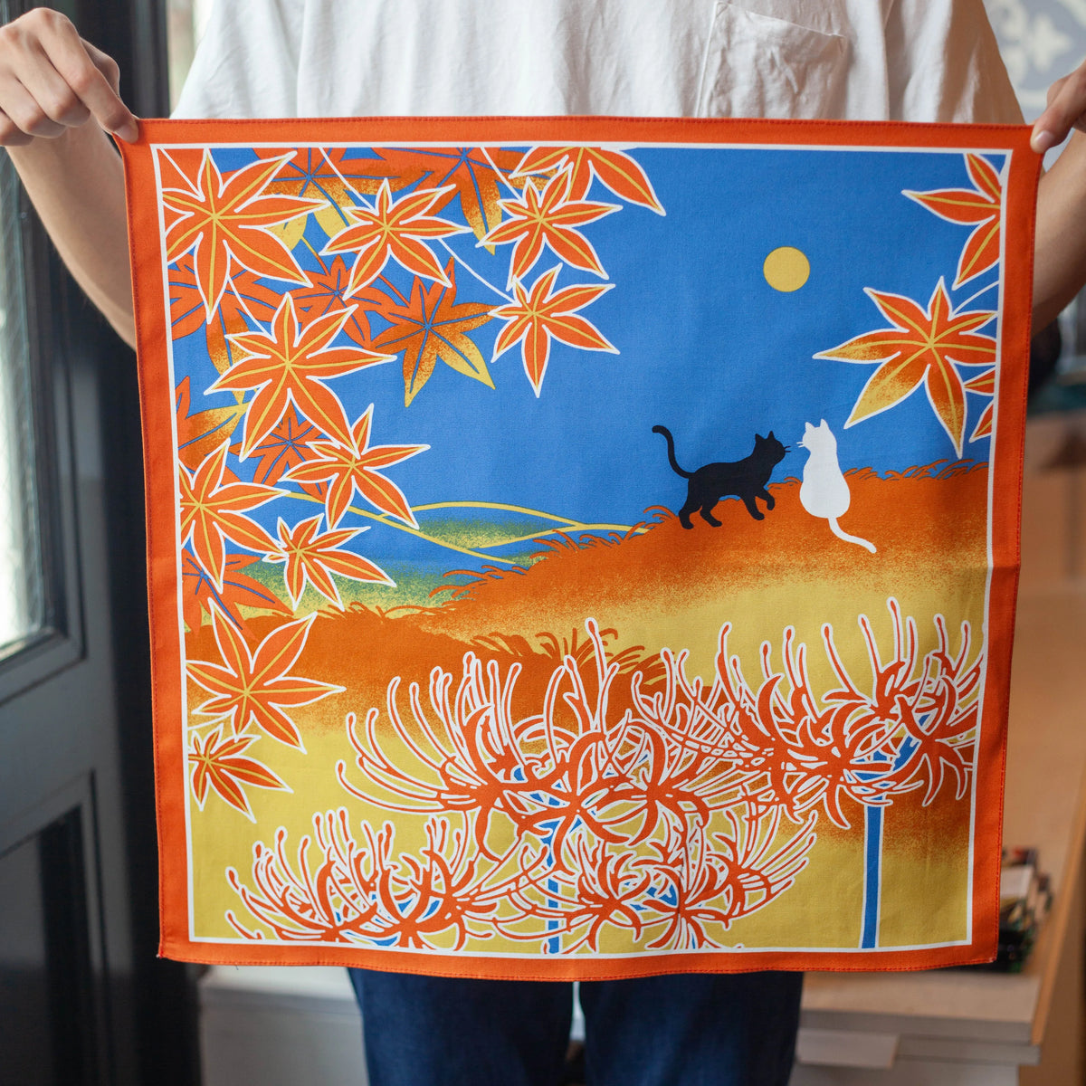 Shiki Neko Fall Furoshiki with black and white cats under a full moon, red maple leaves, and spider lilies