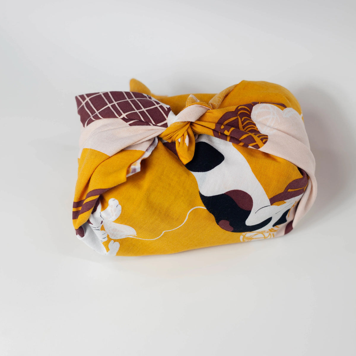 Kotatsu Neko tenugui cloth featuring cats relaxing in a Japanese living room