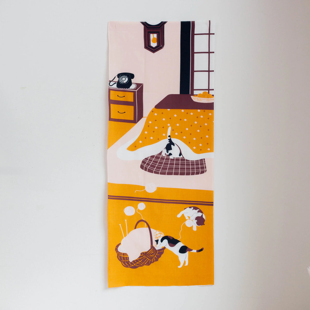 Kotatsu Neko tenugui cloth featuring cats relaxing in a Japanese living room