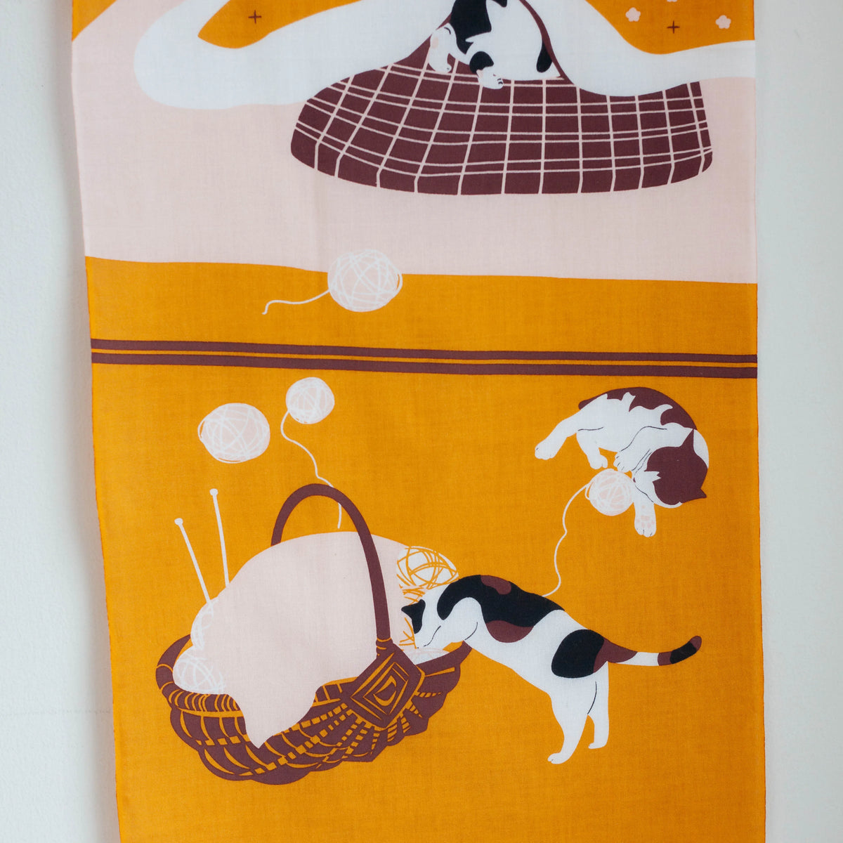 Kotatsu Neko tenugui cloth featuring cats relaxing in a Japanese living room