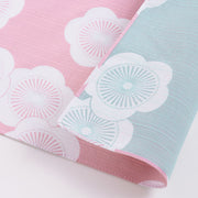 Isa Monyo Reversible Furoshiki 48cm Ume Pink Blue – double-sided Japanese wrapping cloth with large white plum blossom pattern, pink on one side and light blue on the other, 100% cotton, made in Japan

