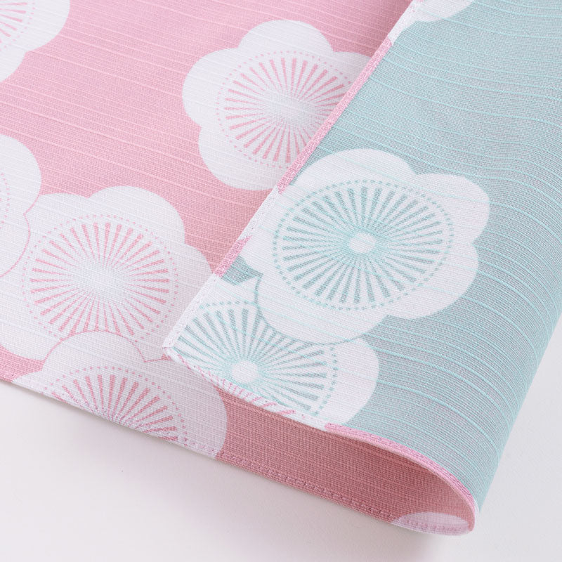 Isa Monyo Reversible Furoshiki 48cm Ume Pink Blue – double-sided Japanese wrapping cloth with large white plum blossom pattern, pink on one side and light blue on the other, 100% cotton, made in Japan

