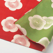 Isa Monyo Reversible Furoshiki 48cm Ume Red Green – double-sided Japanese wrapping cloth with large white plum blossom pattern, red on one side and green on the other, 100% cotton, made in Japan