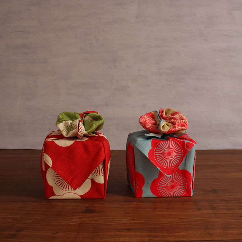 Isa Monyo Reversible Furoshiki 48cm Ume Red Green – double-sided Japanese wrapping cloth with large white plum blossom pattern, red on one side and green on the other, 100% cotton, made in Japan