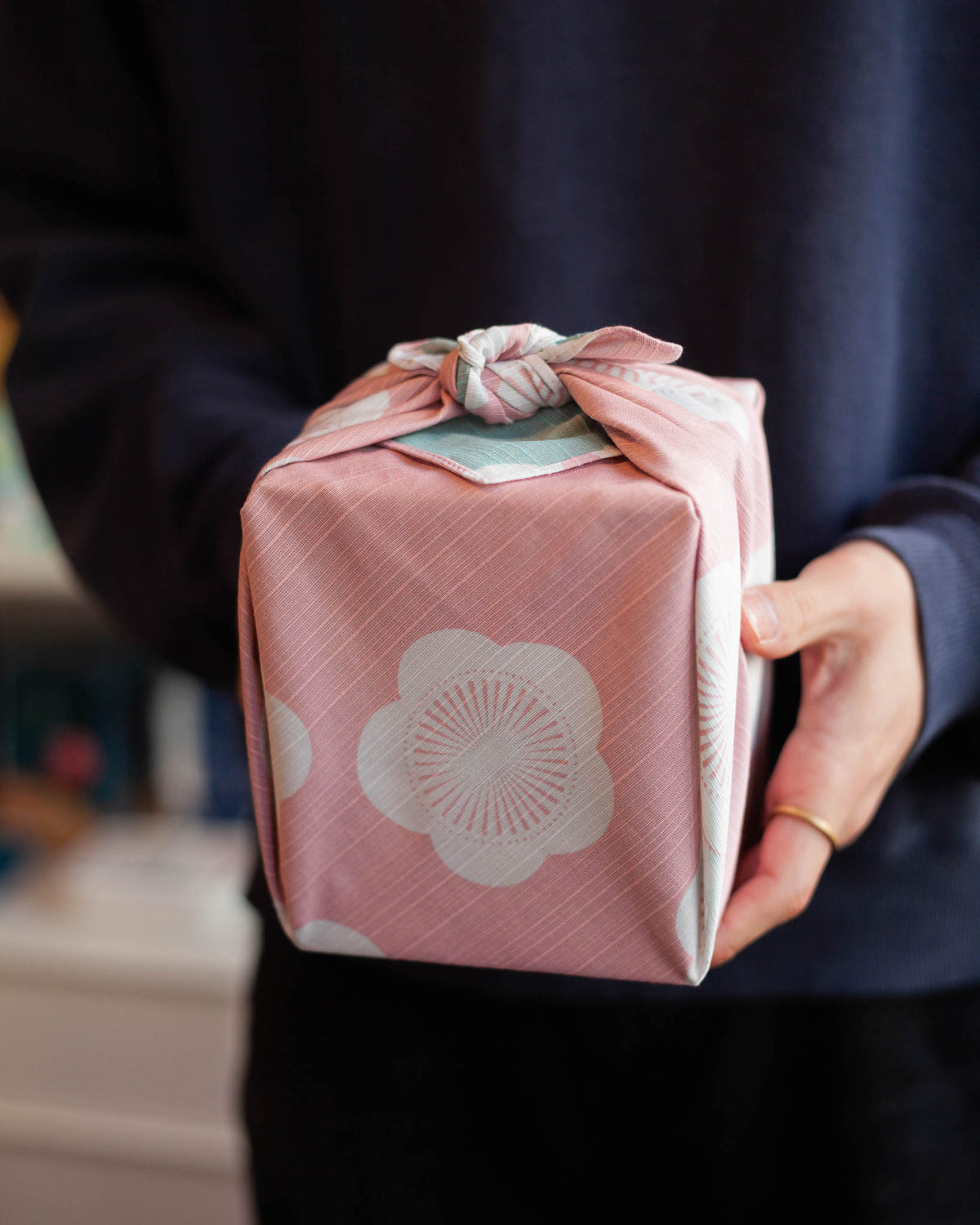 Isa Monyo Reversible Furoshiki 48cm Ume Pink Blue – double-sided Japanese wrapping cloth with large white plum blossom pattern, pink on one side and light blue on the other, 100% cotton, made in Japan