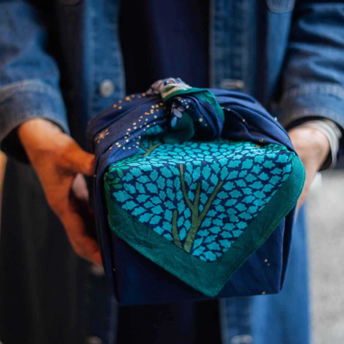 Wine bottle or gift wrapped in Hime Musubi Star Forest Furoshiki, navy starry night pattern organic cotton eco-friendly wrap