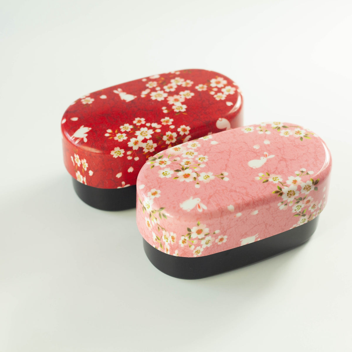 Sakura Usagi Bento Box 830mL in red and pink, featuring cherry blossom and rabbit pattern, top view