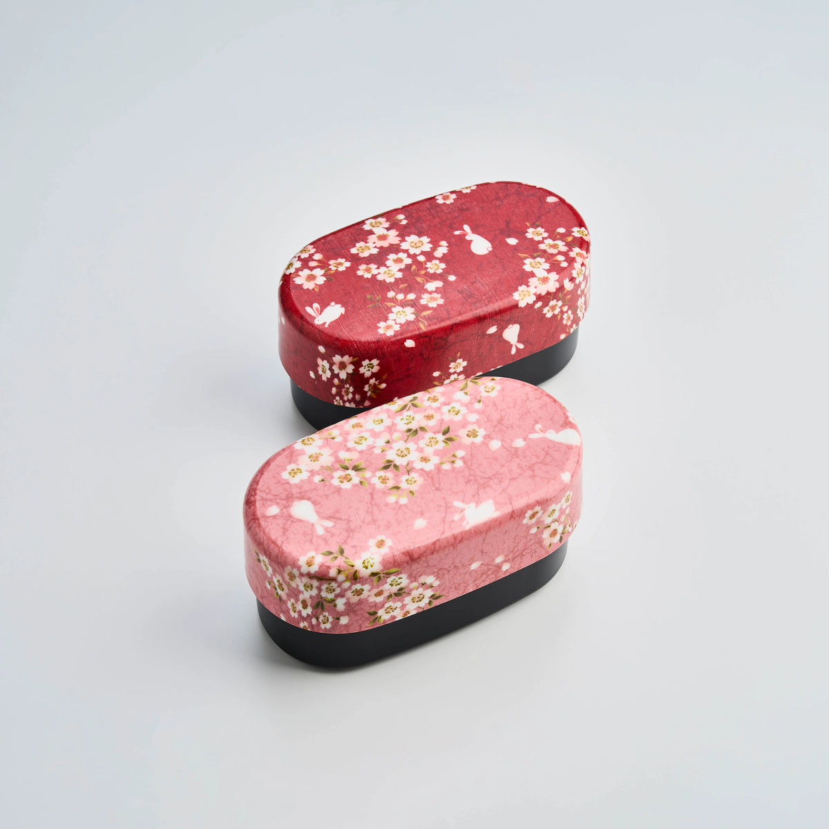Sakura Usagi Bento Box 830mL in red and pink, featuring cherry blossom and rabbit pattern, top view