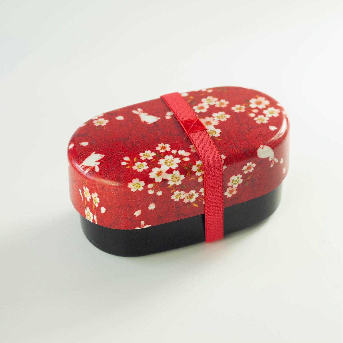 Sakura Usagi Bento Box 830mL in red and pink, featuring cherry blossom and rabbit pattern, top view