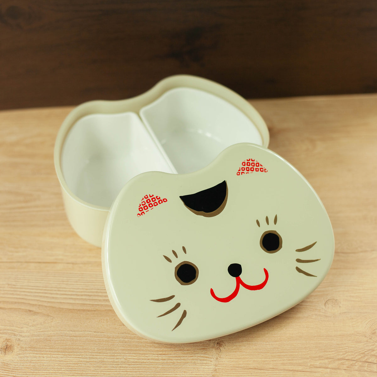 Kao Neko Bento Box with smiling cat face lid, available in white and black