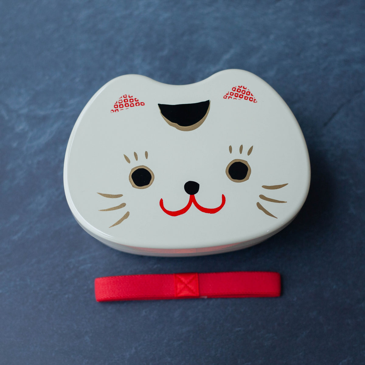 Kao Neko Bento Box with smiling cat face lid, available in white and black