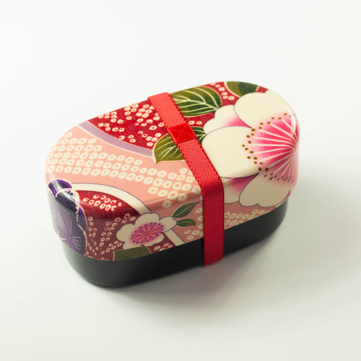 Kimono Sakura Pink Bento Box with red elastic band, overhead angled view – Bento&co