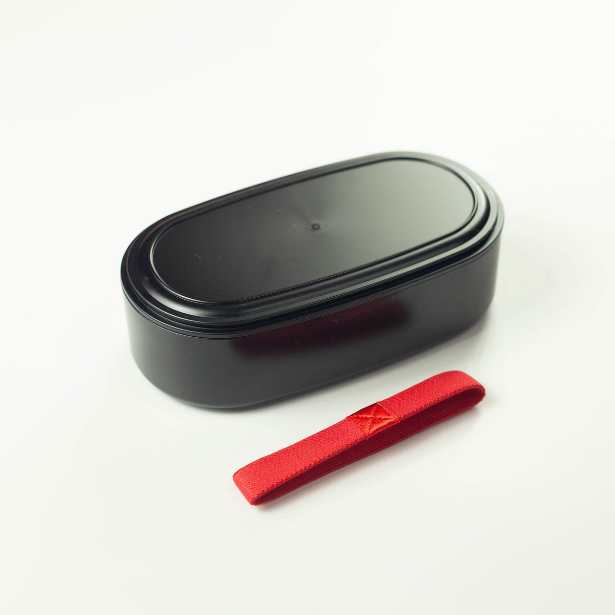 Kimono Sakura Pink Bento Box open with red elastic band beside it – Bento&co