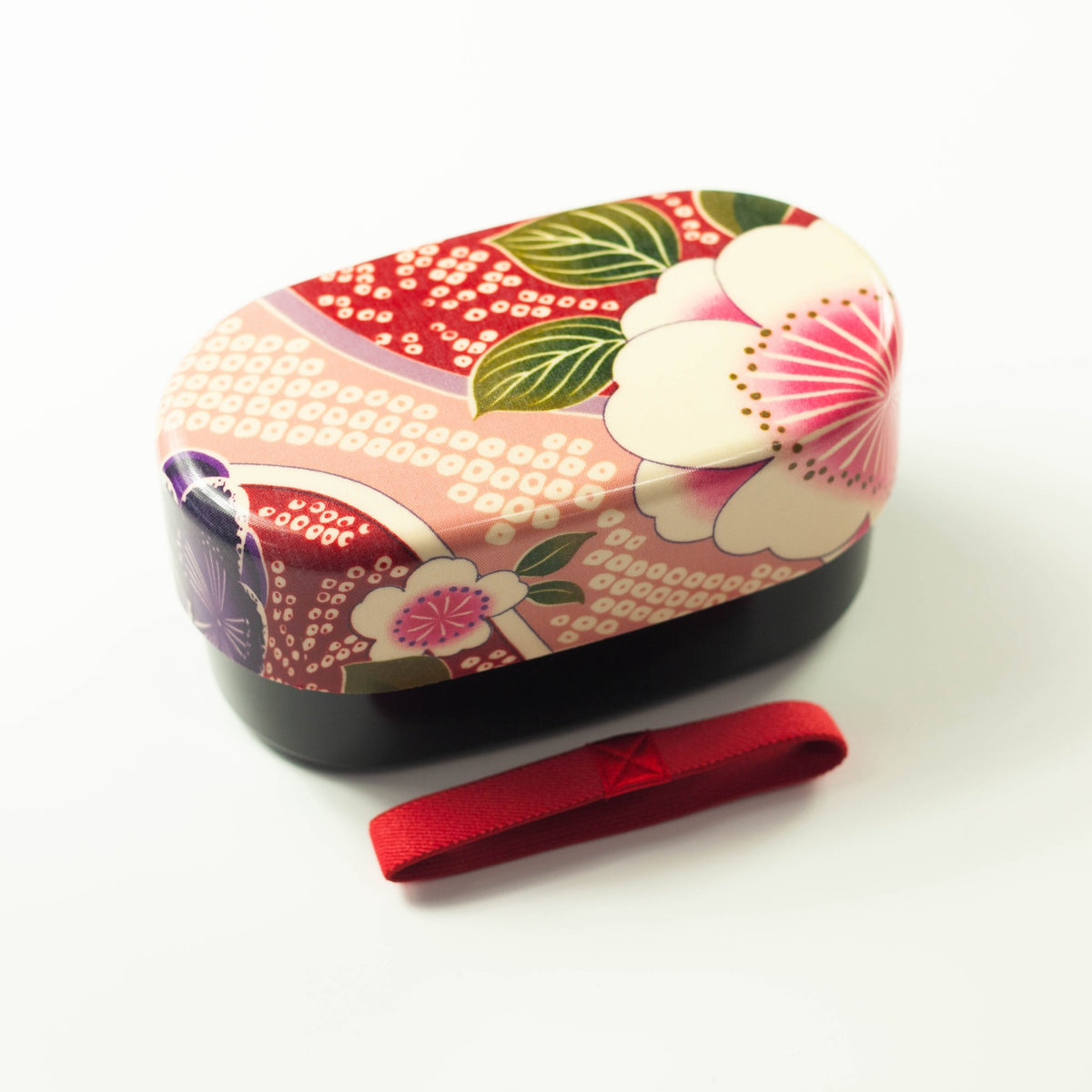 Kimono Sakura Pink Bento Box with red elastic band, overhead angled view – Bento&co