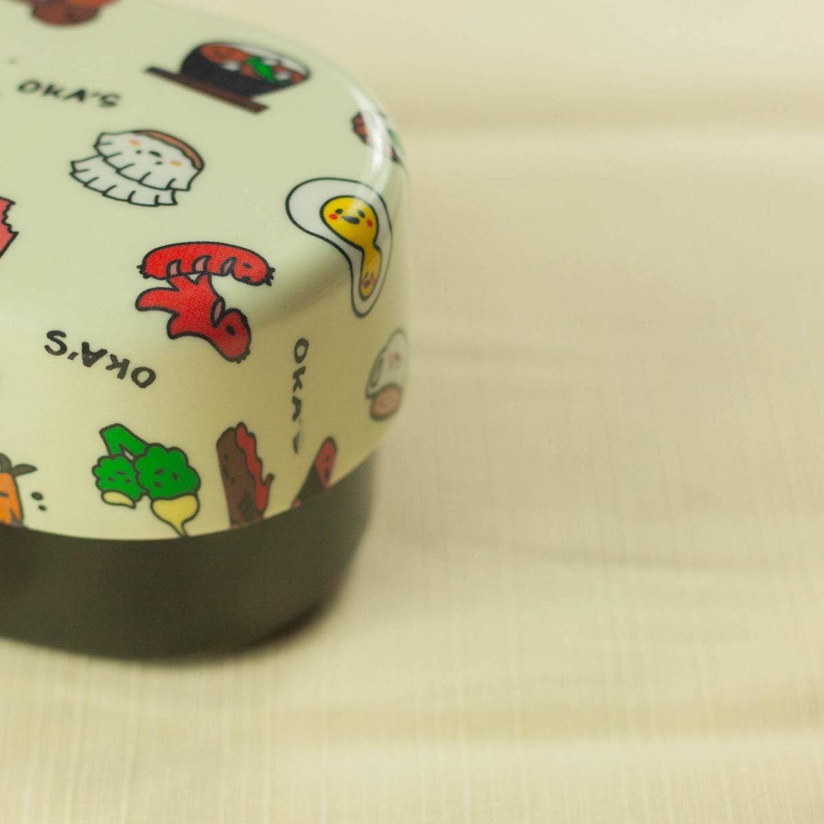 Oka's Oval Bento Box, 830ml, two-tier oval Japanese lunch box with a whimsical side-dish print