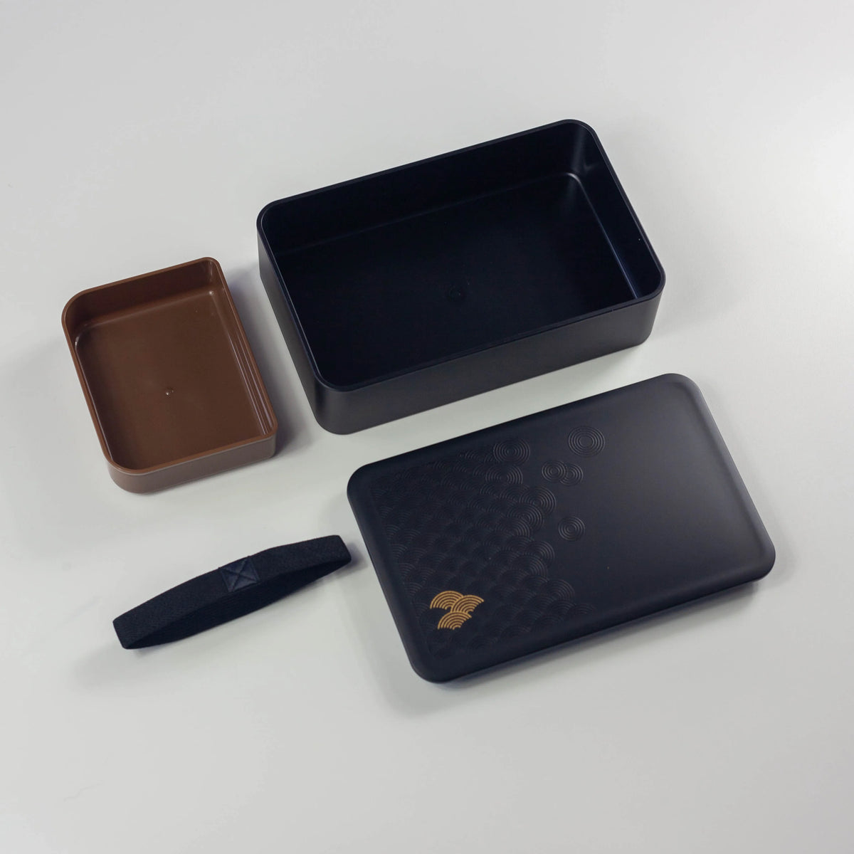 Wamon Bento Box 800mL black seigaiha closed with elastic band and matching chopstick case with chopsticks