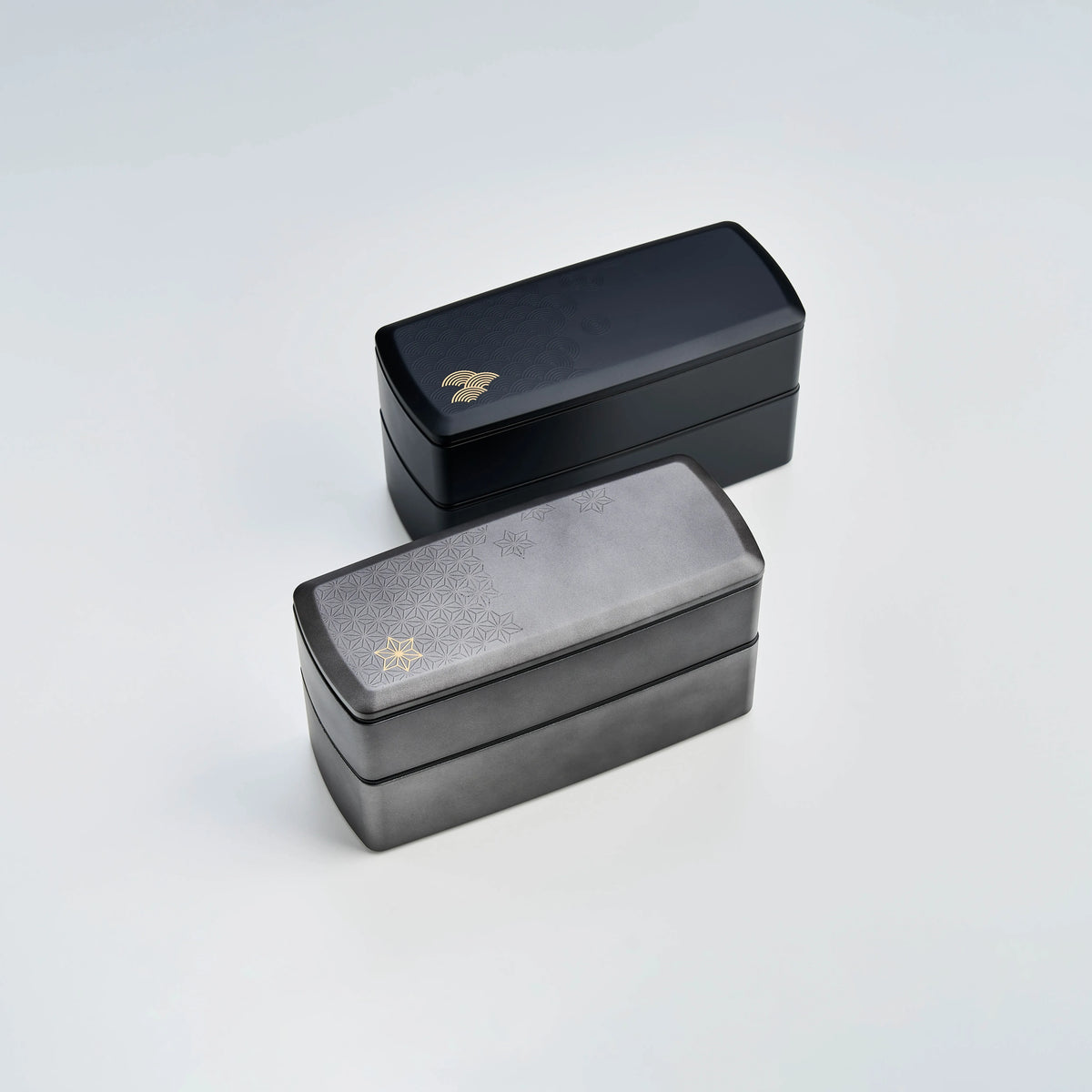 Wamon Bento Box 1000mL – bottom view of two black seigaiha and one grey maple leaf variant showing product labels