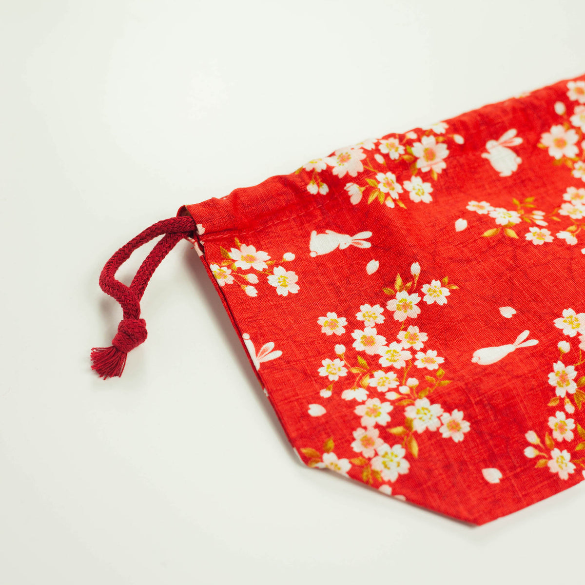 Sakura Usagi Bento Bag in Red with a cherry blossom and rabbit pattern