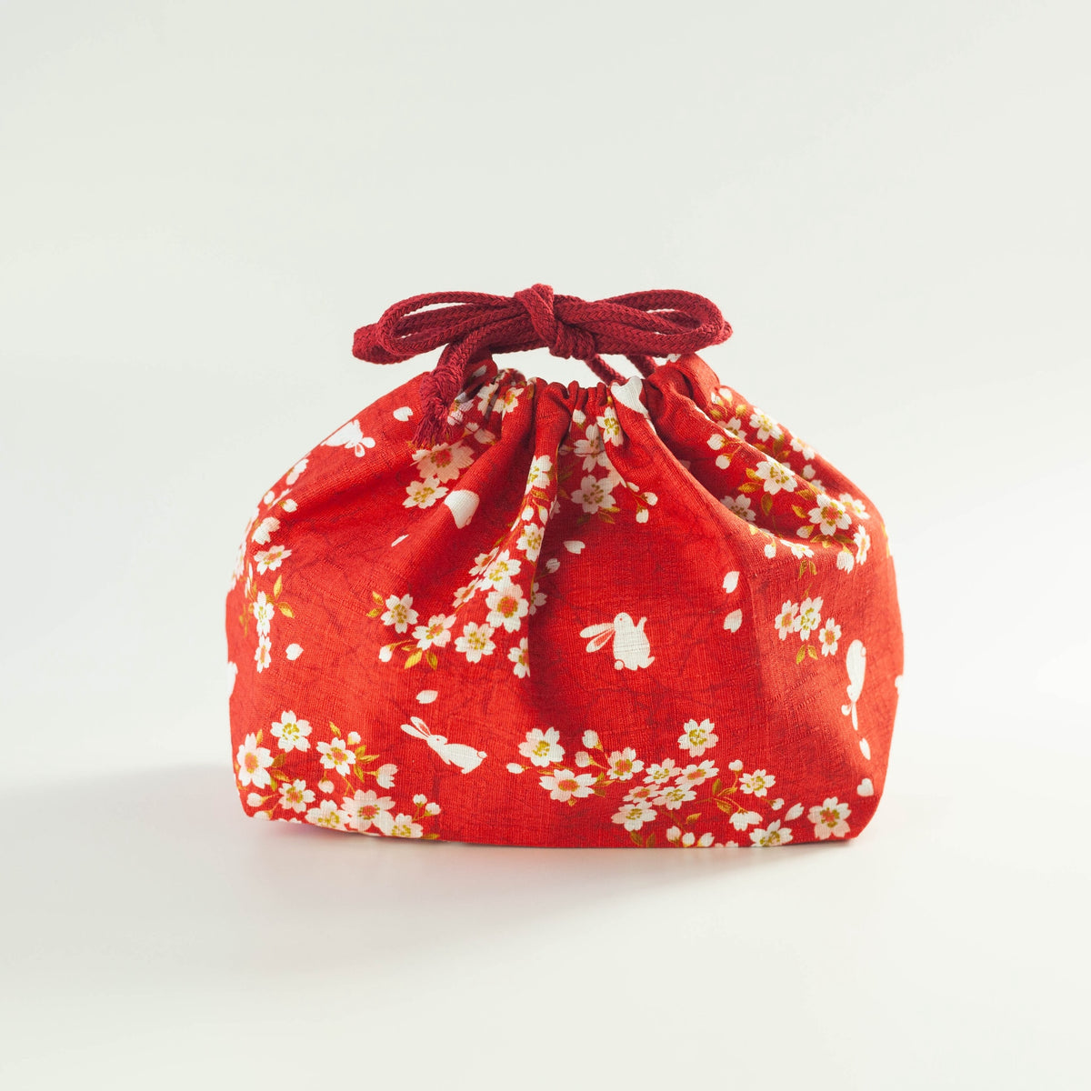 Sakura Usagi Bento Bag in Pink and Red with a cherry blossom and rabbit pattern