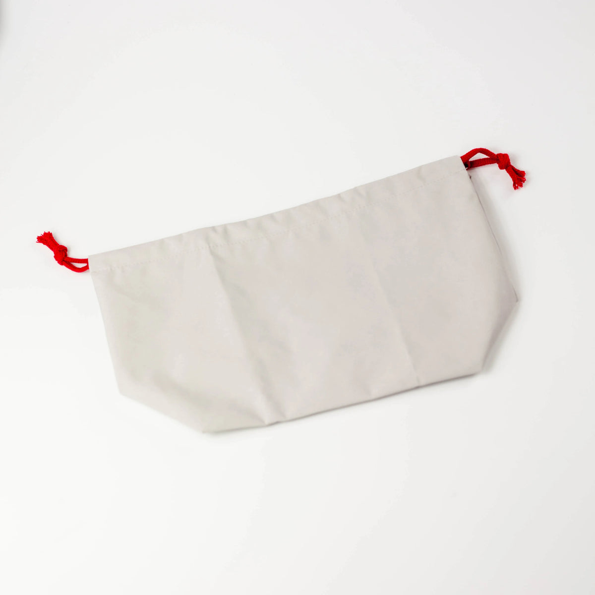 Water Repellent Drawstring Bag in  grey white with red drawstring cord, closed, front view on white background