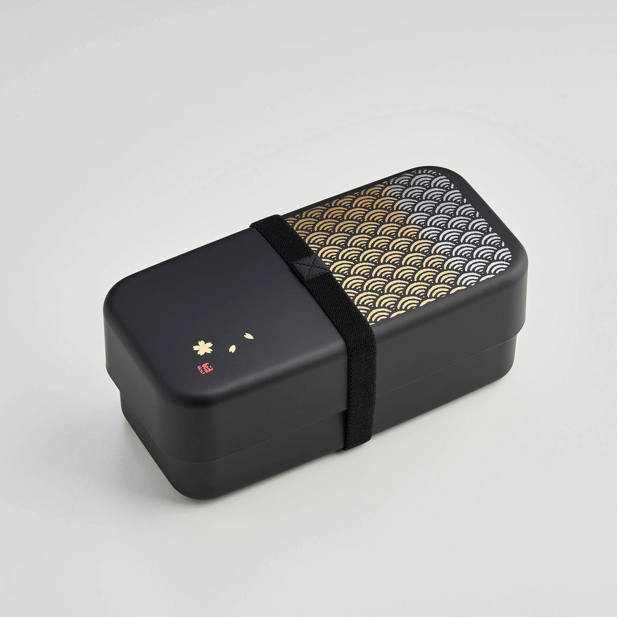 Nami Bento Box, matte-black two-tier bento box with traditional Japanese seigaiha wave pattern in muted gold, 950ml, made in Japan