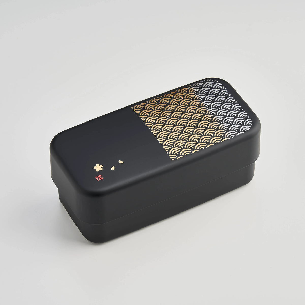 Nami Bento Box, matte-black two-tier bento box with traditional Japanese seigaiha wave pattern in muted gold, 950ml, made in Japan