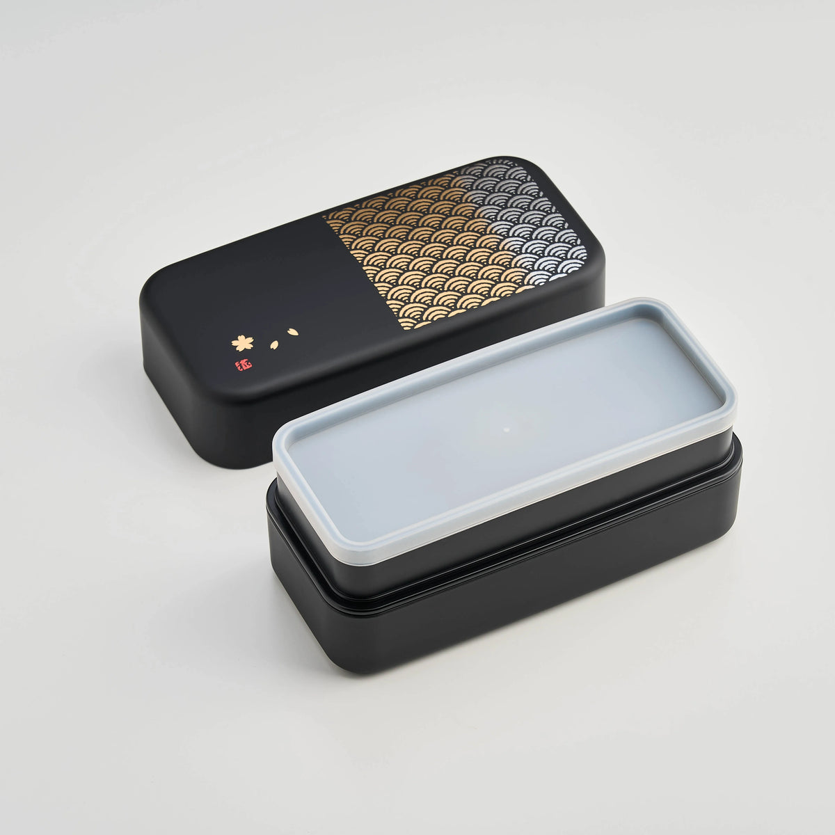 Nami Bento Box, matte-black two-tier bento box with traditional Japanese seigaiha wave pattern in muted gold, 950ml, made in Japan