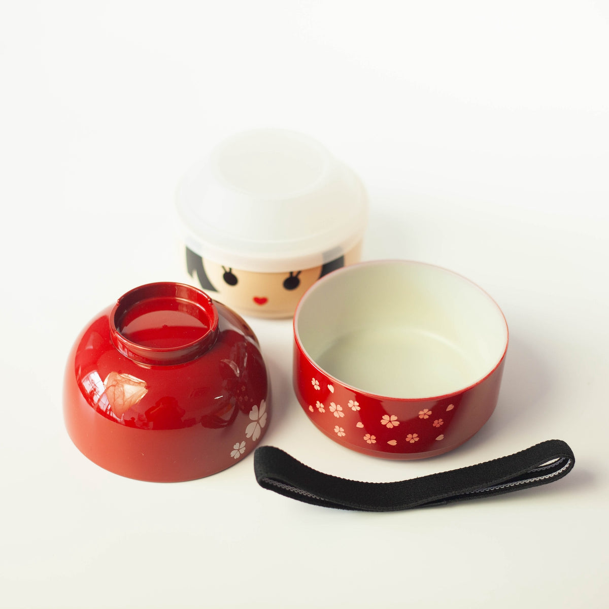 Kokeshi Bento Box Hanako disassembled showing soup bowl, bento tier, and elastic band