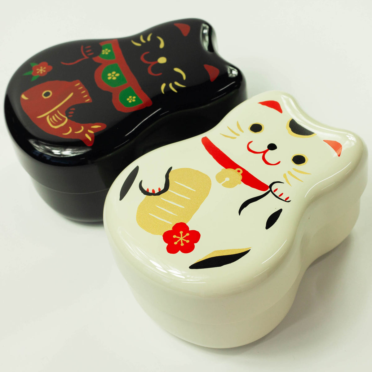 Maruko Neko Bento Box with Japanese beckoning cat design, available in black and white