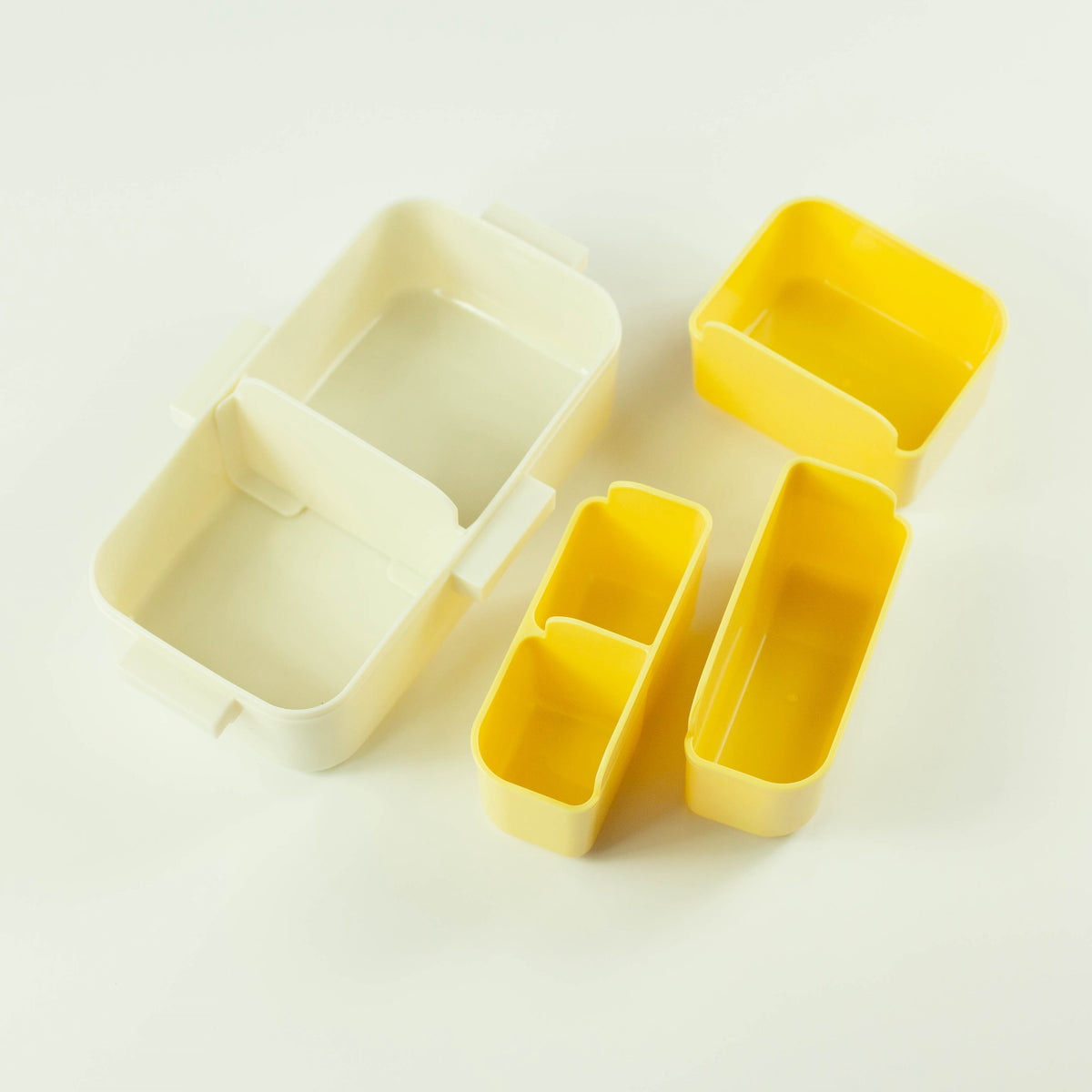 Beige Shikiri Slim Bento Box with a secure silicone-sealed lid