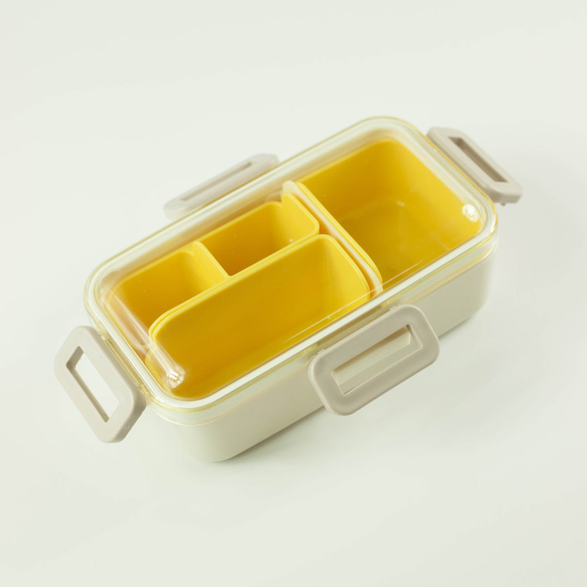 Beige Shikiri Slim Bento Box with a secure silicone-sealed lid