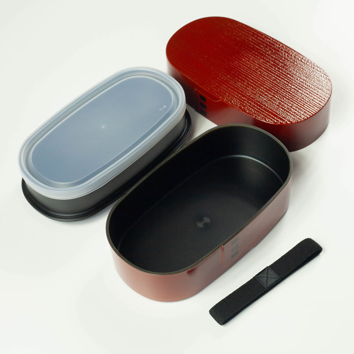 Nuri Wappa Bento Box in Dark Wood, Red Wood, and Light Wood, inside