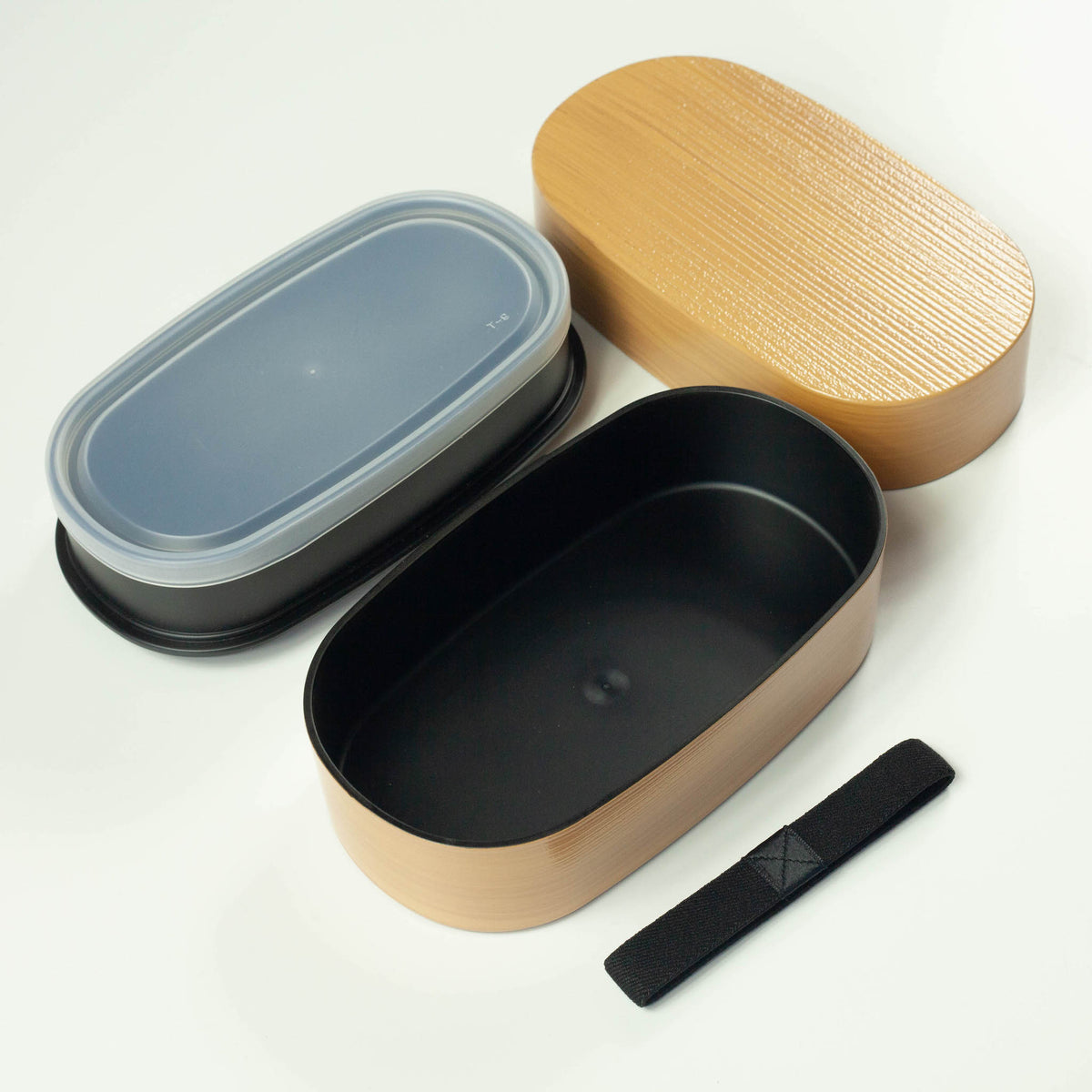 Nuri Wappa Bento Box in Dark Wood, Red Wood, and Light Wood
