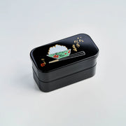 Itadakimasu two-tier bento box with rice bowl and chopsticks illustration
