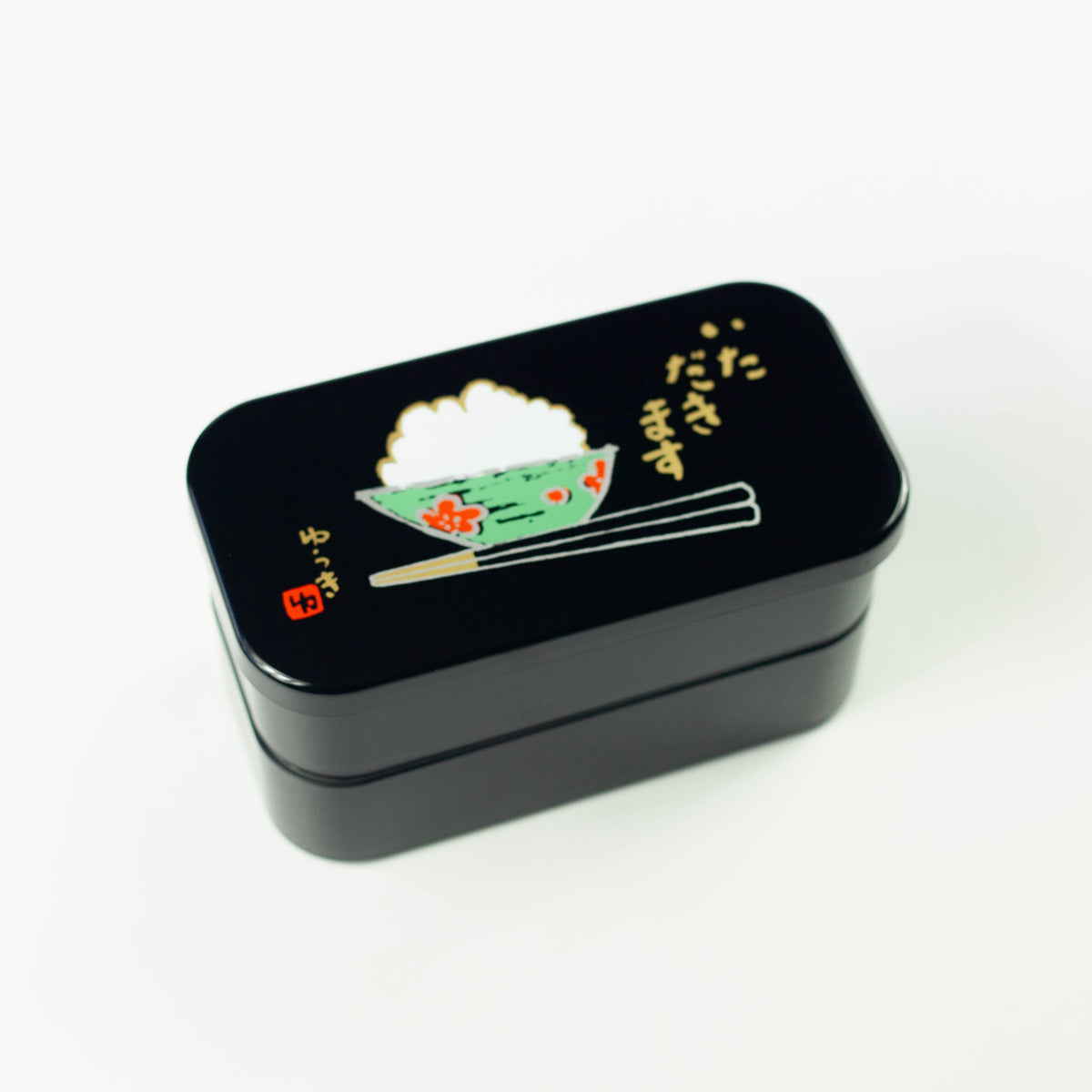 Itadakimasu two-tier bento box with rice bowl and chopsticks illustration