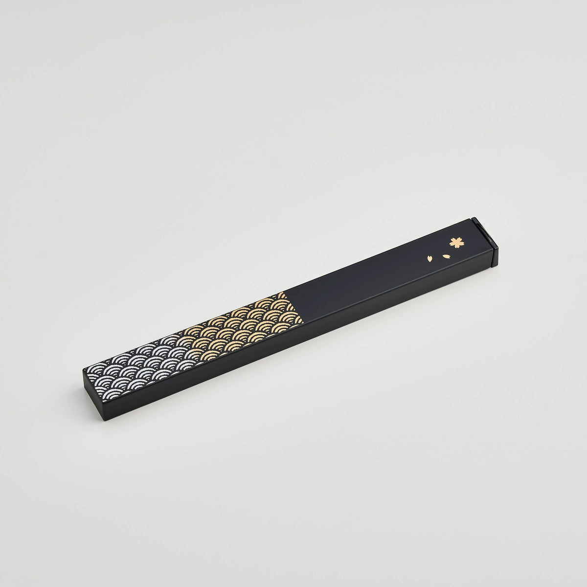 Nami Chopsticks Set with black slide-style case and gold wave pattern