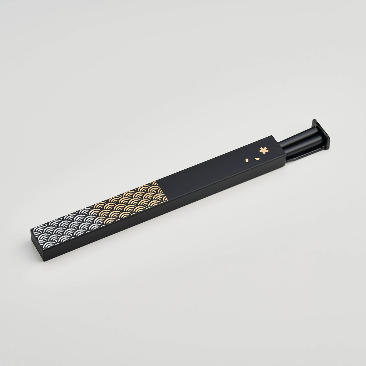 Nami Chopsticks Set with black slide-style case and gold wave pattern