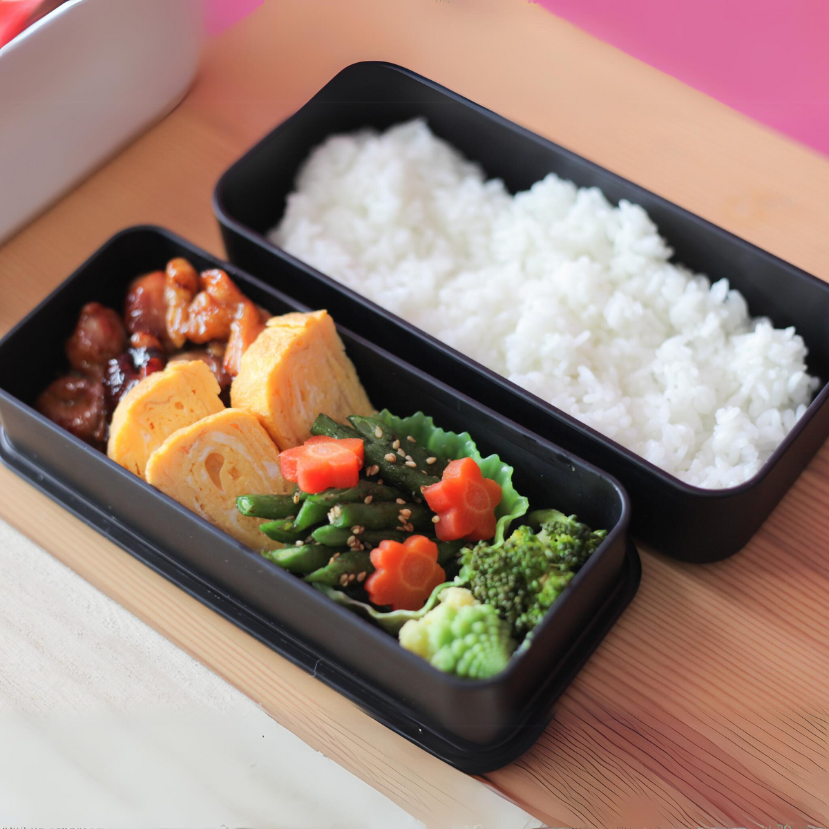 Nami Bento Box, matte-black two-tier bento box with traditional Japanese seigaiha wave pattern in muted gold, 950ml, made in Japan