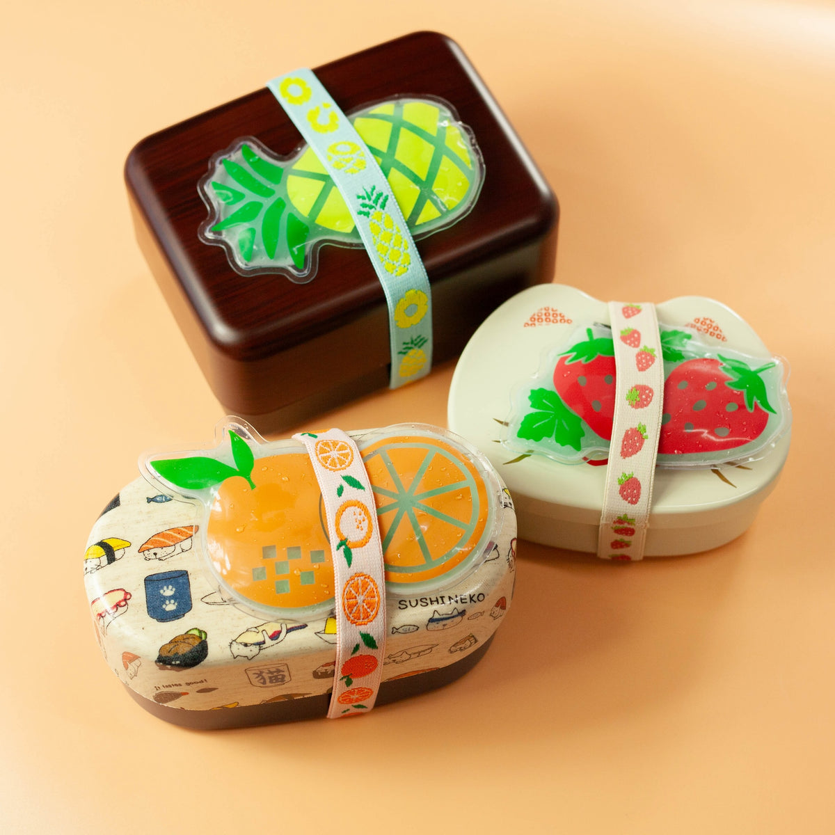 Fruit ice pack and matching lunch band set in orange, strawberry and pineapple designs