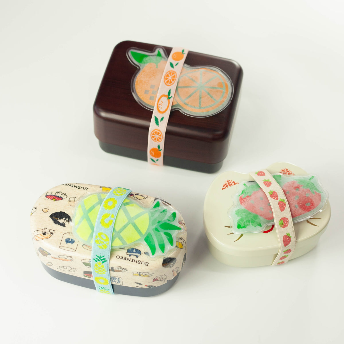Fruit ice pack and matching lunch band set in orange, strawberry and pineapple designs
