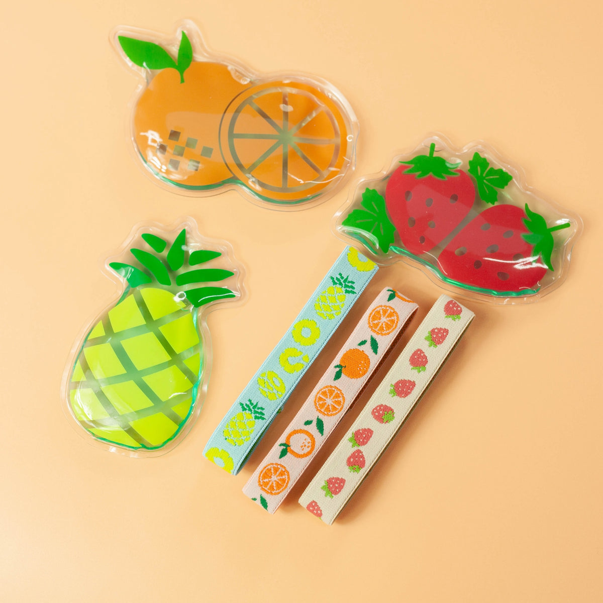 Fruit ice pack and matching lunch band set in orange, strawberry and pineapple designs